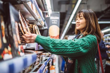 shopper tesco pizza aisle shopping GettyImages-1479783892