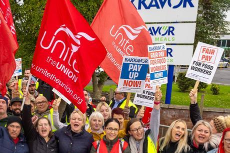 Workers on strike holding signs outside Bakkavor Spalding strike action