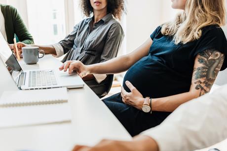 pregnant business meeting