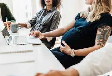 pregnant business meeting